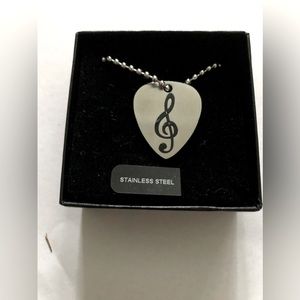Treble clef pendant